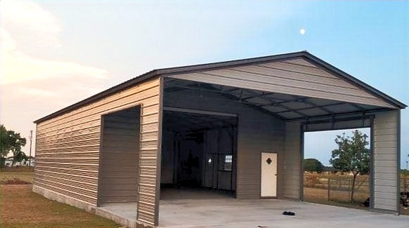 Metal carport and storage combo unit in Tyler, Texas providing covered parking with attached enclosed storage space.